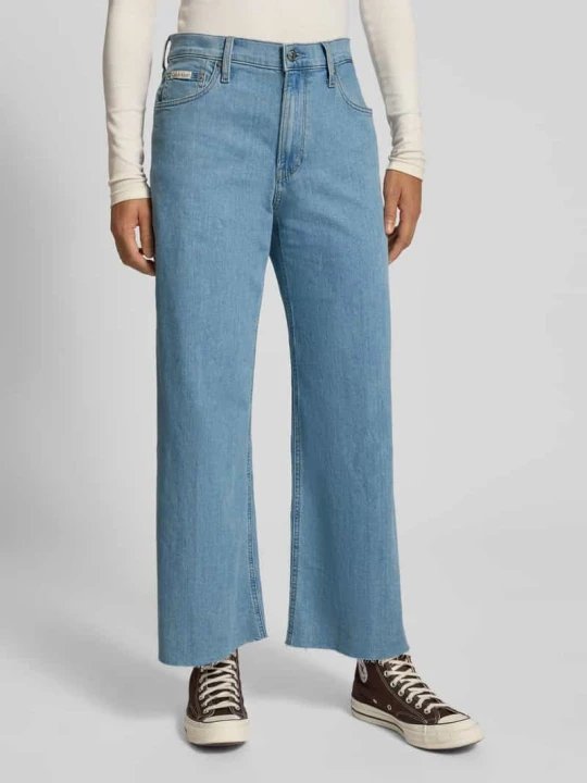 Zdjęcie produktu Jeansy z szeroką nogawką, bardzo wysokim stanem i frędzlami Calvin Klein Jeans Jasnoniebieski