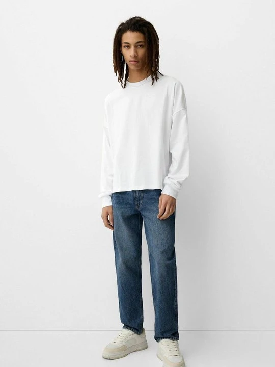 Zdjęcie produktu Jeansy Zwężane Bershka granatowy