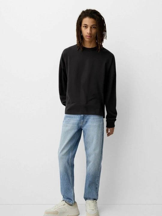 Zdjęcie produktu Jeansy Zwężane Bershka niebieski