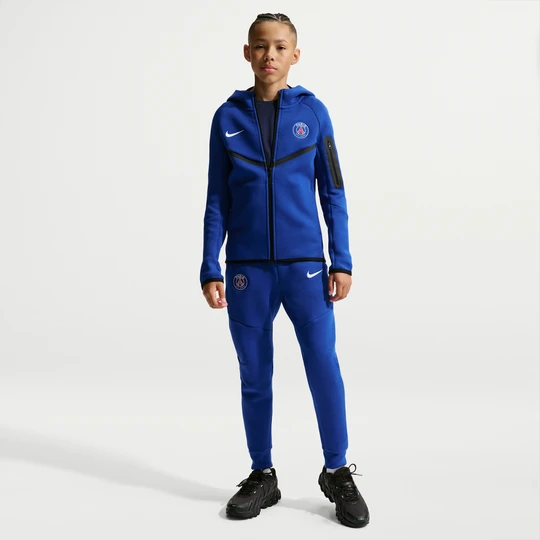Zdjęcie produktu Joggery piłkarskie dla dużych dzieci (chłopców) Nike Paris Saint-Germain Tech Fleece - Niebieski