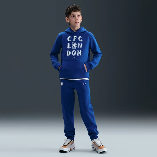 Zdjęcie produktu Joggery piłkarskie z dzianiny dla dużych dzieci (chłopców) Nike Chelsea F.C. Club - Niebieski