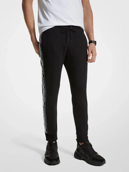 Zdjęcie produktu Joggery z mieszanki bawełny z taśmą z logo Michael Kors CZARNY (Czarny)