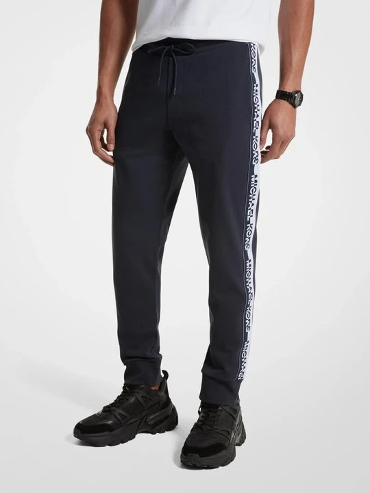 Zdjęcie produktu Joggery z mieszanki bawełny z taśmą z logo Michael Kors PÓŁNOC (Niebieski)