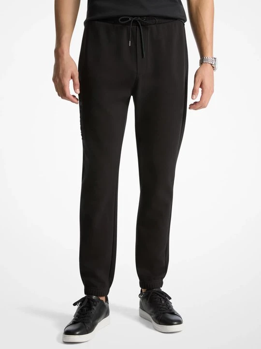 Zdjęcie produktu Joggery z wytłoczonym logo z mieszanki bawełny Michael Kors CZARNY (Czarny)