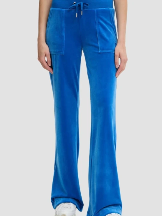 Zdjęcie produktu JUICY COUTURE Chabrowe spodnie dresowe damskie Layla Low Rise, Rozmiar M Niebieski