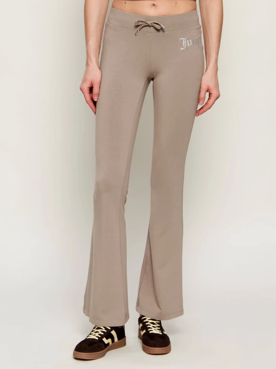 Zdjęcie produktu Juicy Couture Spodnie dresowe APOLLO | flare fit beżowy