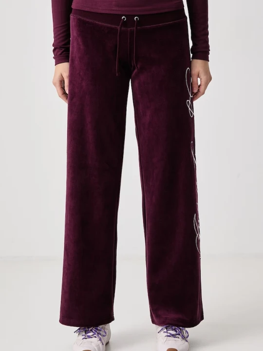 Zdjęcie produktu Juicy Couture spodnie dresowe damskie z bawełną SCRIPT REBELLE OG STRAIGHT bordowy