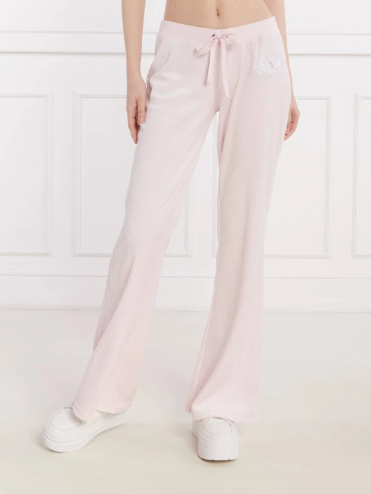 Zdjęcie produktu Juicy Couture Spodnie dresowe HERITAGE DOG CREST KAISA | flare fit pudrowy róż