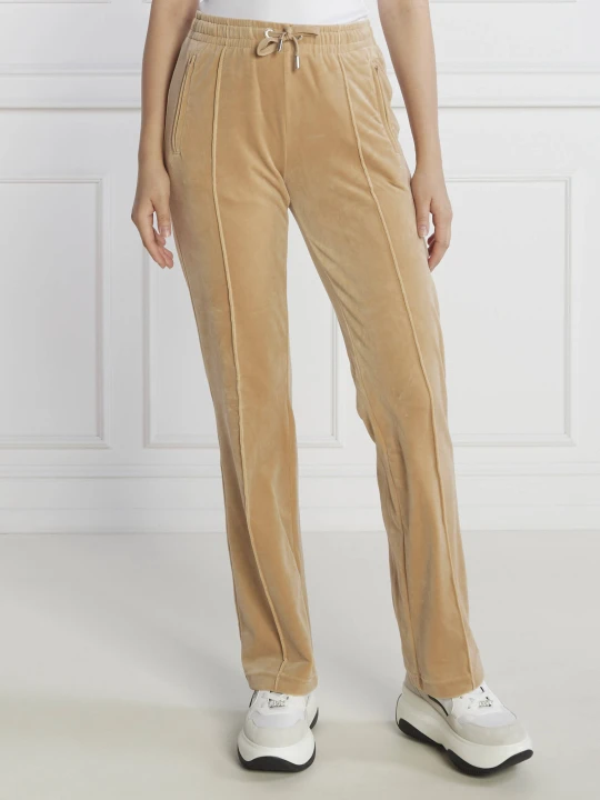 Zdjęcie produktu Juicy Couture Spodnie dresowe TINA | Regular Fit beżowy