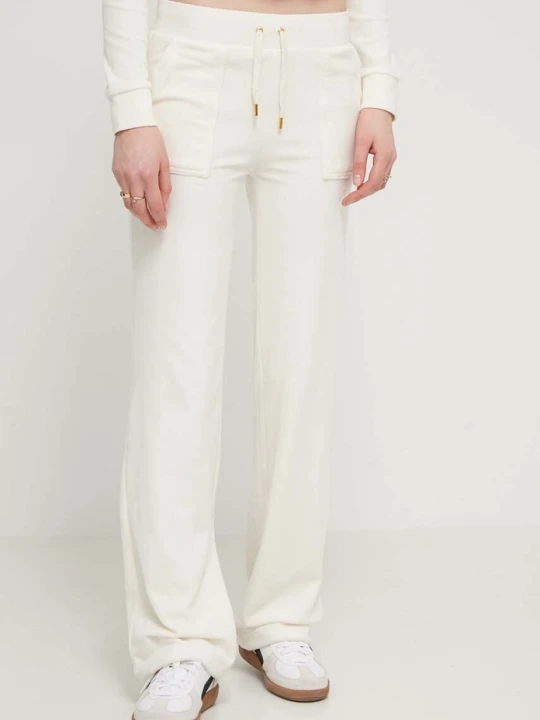Zdjęcie produktu Juicy Couture spodnie dresowe welurowe beżowy