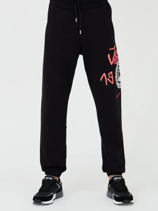 Zdjęcie produktu JUST CAVALLI Czarne męskie spodnie z nadrukiem R 1998 Dripp, Rozmiar M