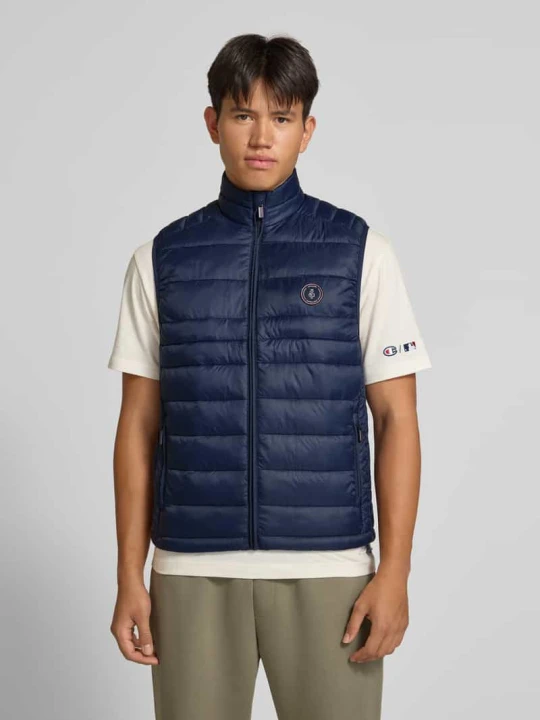 Zdjęcie produktu Kamizelka pikowana z kieszeniami zapinanymi na zamek błyskawiczny model 'KINGSLEY' Jack&Jones Ciemnoniebieski