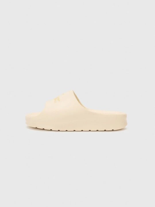 Zdjęcie produktu Kapcie Lacoste mleczny