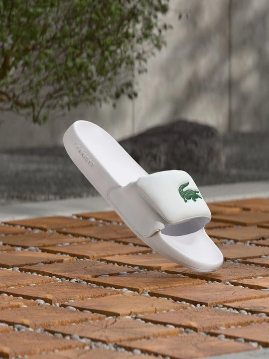 Zdjęcie produktu Klapki płaskie Lacoste biały