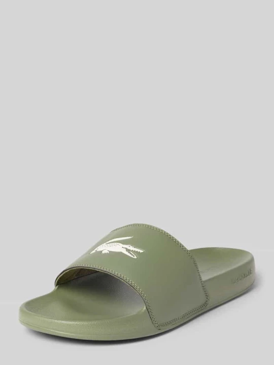 Zdjęcie produktu Klapki z nadrukiem z logo model 'SERVE SLIDE 0.0' Lacoste Khaki