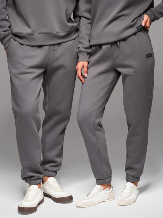 Zdjęcie produktu Klasyczne spodnie dresowe ze ściągaczami unisex– szare V18 - Rozmiar: XS / S Ombre Clothing