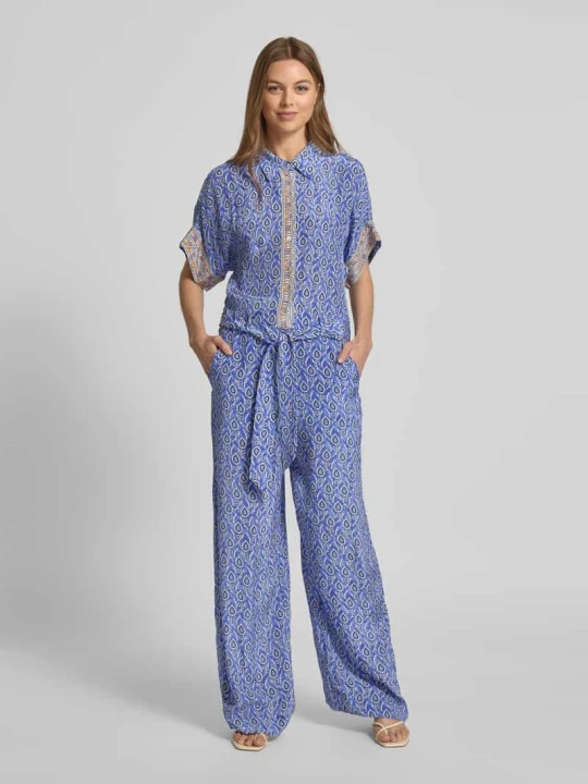 Zdjęcie produktu Kombinezon z wiskozy z wiązanym paskiem model ‘Mathilde’ Lollys Laundry Królewski niebieski