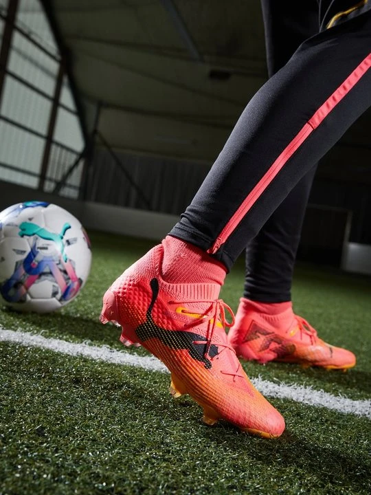 Zdjęcie produktu Buty piłkarskie na twardą nawierzchnię Puma pomarańczowy melanż