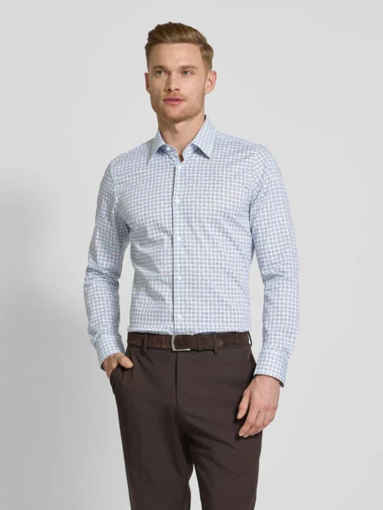 Zdjęcie produktu Koszula biznesowa męska JOOP! Collection;Mieszanka bawełny z dodatkiem streczu;Krój regular fit;Model ‘Pierce’;Design z długim rękawem;Kołnierzyk typu kent;Spor Jasnoniebieski