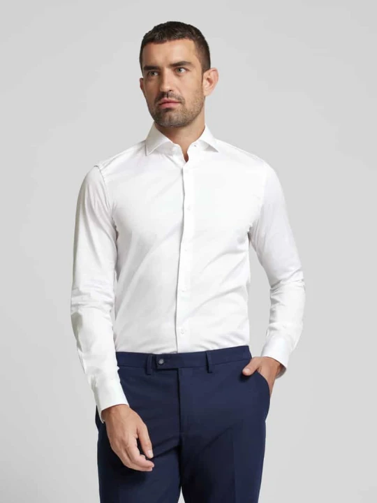 Zdjęcie produktu Koszula biznesowa męska JOOP! Collection; Mieszanka bawełny z dodatkiem streczu; Krój slim fit; Model ‘Pares’; Kołnierzyk typu cutaway; Listwa guzikowa na całej dług Biały