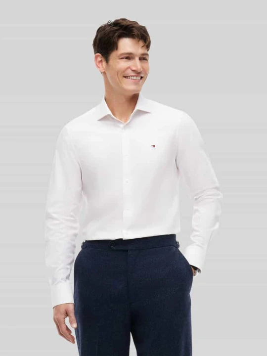 Zdjęcie produktu Koszula biznesowa o kroju regular fit z zaokrąglonym dołem Tommy Hilfiger Biały
