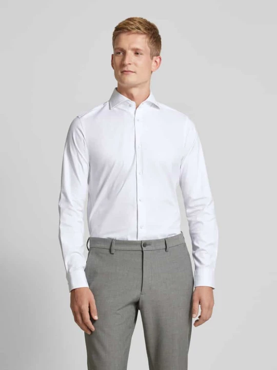 Zdjęcie produktu Koszula biznesowa męska JOOP! Collection;Mieszanka bawełny z dodatkiem streczu;Krój slim fit;Model ‘Pares’;Kołnierzyk typu cutaway;Listwa guzikowa na całej dług Biały