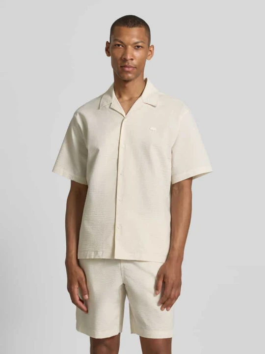 Zdjęcie produktu Koszula casual o kroju relaxed fit z czystej bawełny Lacoste Złamany biały