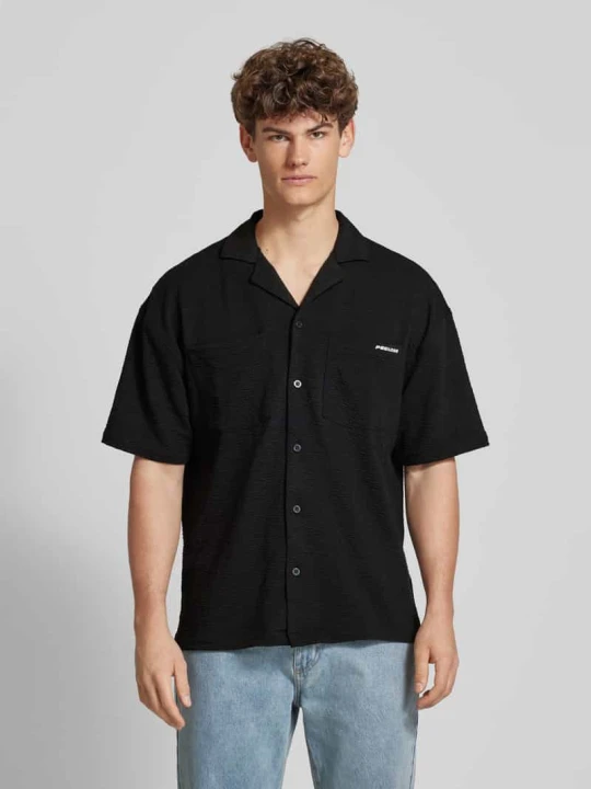 Zdjęcie produktu Koszula casualowa o kroju oversized fit z rękawem o dł. 1 / 2 model ‘ACADO’ Pegador Czarny