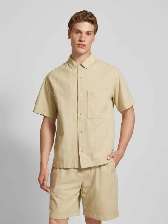 Zdjęcie produktu Koszula casualowa o kroju regular fit z kieszenią na piersi Calvin Klein Jeans Beżowy