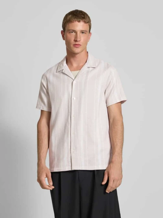 Zdjęcie produktu Koszula casualowa o kroju regular fit ze wzorem na całej powierzchni Tommy Jeans Beżowy
