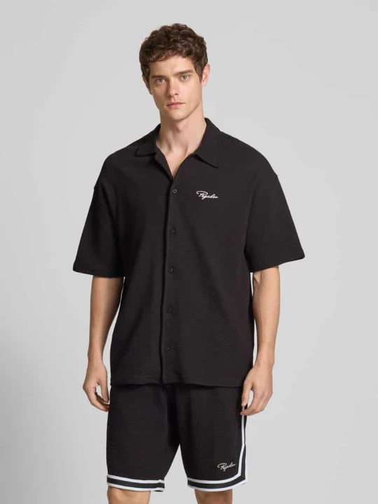 Zdjęcie produktu Koszula casualowa o kroju relaxed fit z fakturowanym wzorem model ‘SIGNAR’ Pegador Czarny