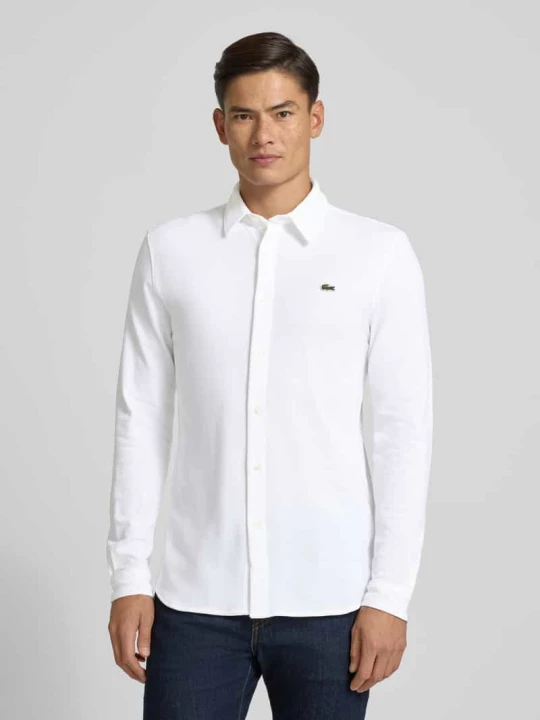 Zdjęcie produktu Koszula casualowa o kroju slim fit z fakturą Lacoste Biały