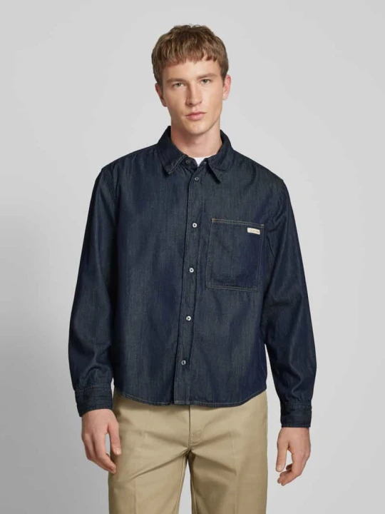 Zdjęcie produktu Koszula jeansowa o kroju regular fit z detalem z logo Calvin Klein Jeans Jeansowy niebieski