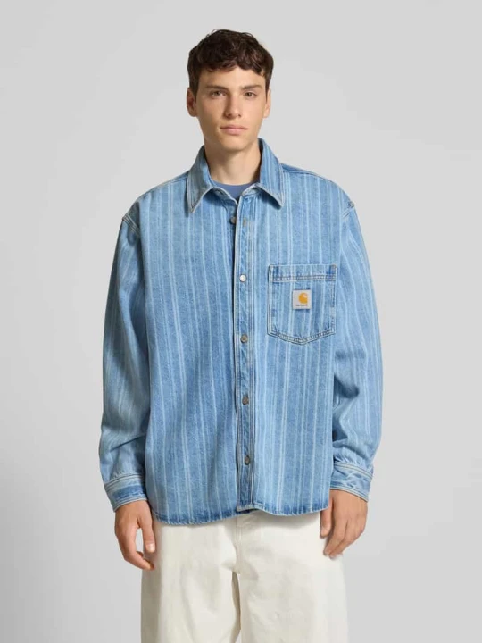 Zdjęcie produktu Koszula jeansowa o kroju relaxed fit z kieszenią na piersi model ‘Rylan’ Carhartt WIP Jeansowy niebieski