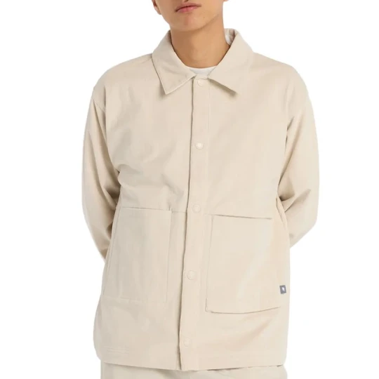 Zdjęcie produktu Koszula męska New Balance MT53524TWF - beżowa