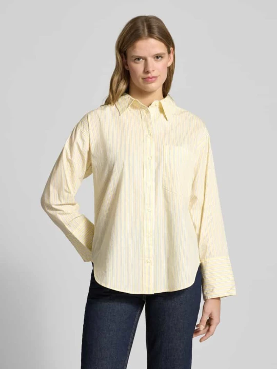 Zdjęcie produktu Koszula o kroju relaxed fit z kieszenią na piersi model 'Poplin' Gina Tricot Pastelowy żółty