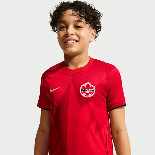 Zdjęcie produktu Koszulka piłkarska dla dużych dzieci Nike Dri-FIT Kanada Stadium 2026 (wersja domowa) – replika - Czerwony