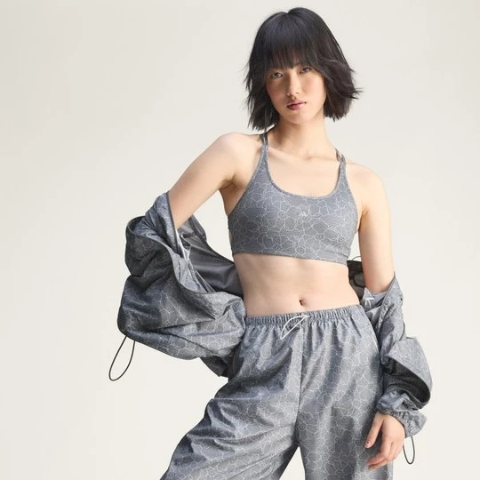 Zdjęcie produktu Koszulka do biegania adidas by Stella McCartney o skróconym fasonie mini z nadrukiem