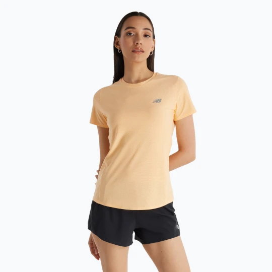 Zdjęcie produktu Koszulka do biegania damska New Balance Jacquard Slim peach blossom Pomarańczowy
