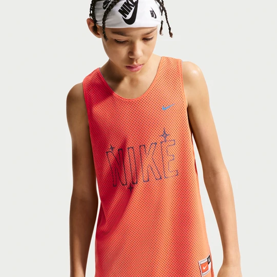 Zdjęcie produktu Koszulka do koszykówki dla dużych dzieci Nike Dri-FIT - Pomarańczowy