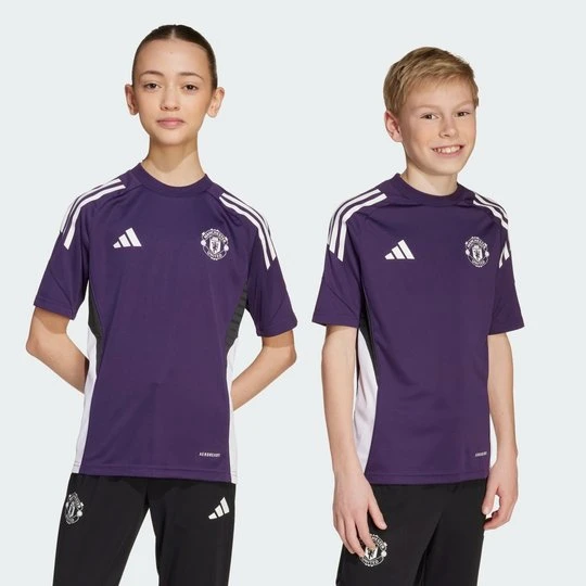 Zdjęcie produktu Koszulka Manchester United Tiro 25 Competition Training Kids Adidas fioletowy