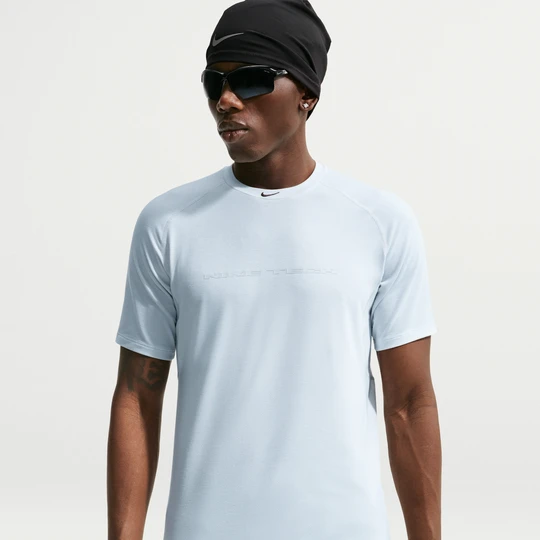 Zdjęcie produktu Koszulka męska z krótkim rękawem Dri-FIT Nike Tech - Biel