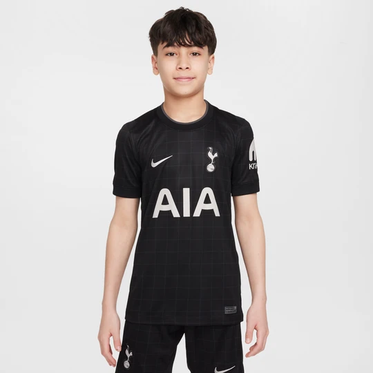 Zdjęcie produktu Koszulka piłkarska dla dużych dzieci Nike Dri-FIT Tottenham Hotspur Stadium 2025/26 (wersja wyjazdowa) – replika - Czerń