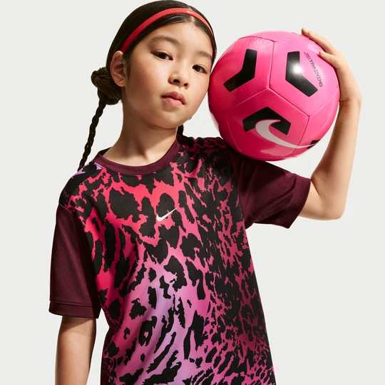 Zdjęcie produktu Koszulka piłkarska z krótkim rękawem dla dużych dzieci (dziewcząt) Dri-FIT Nike United Academy - Czerwony