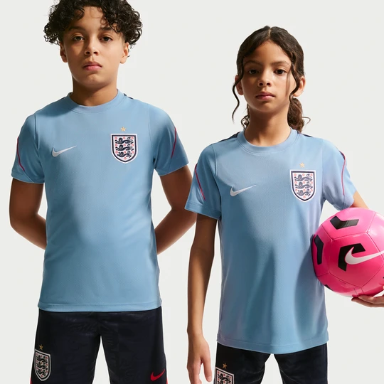 Zdjęcie produktu Koszulka piłkarska z krótkim rękawem dla dużych dzieci Nike Dri-FIT Anglia Strike - Niebieski