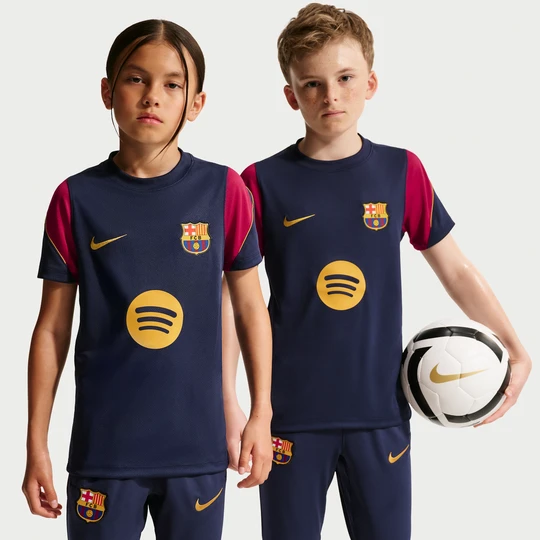 Zdjęcie produktu Koszulka piłkarska z krótkim rękawem dla dużych dzieci Nike Dri-FIT FC Barcelona Strike - Niebieski