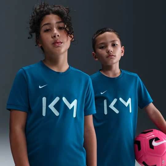 Zdjęcie produktu Koszulka piłkarska z krótkim rękawem dla dużych dzieci Nike Dri-FIT Kylian Mbappé Academy - Niebieski