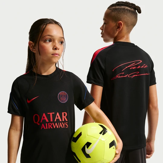Zdjęcie produktu Koszulka piłkarska z krótkim rękawem dla dużych dzieci Nike Dri-FIT Paris Saint-Germain Strike - Czerń