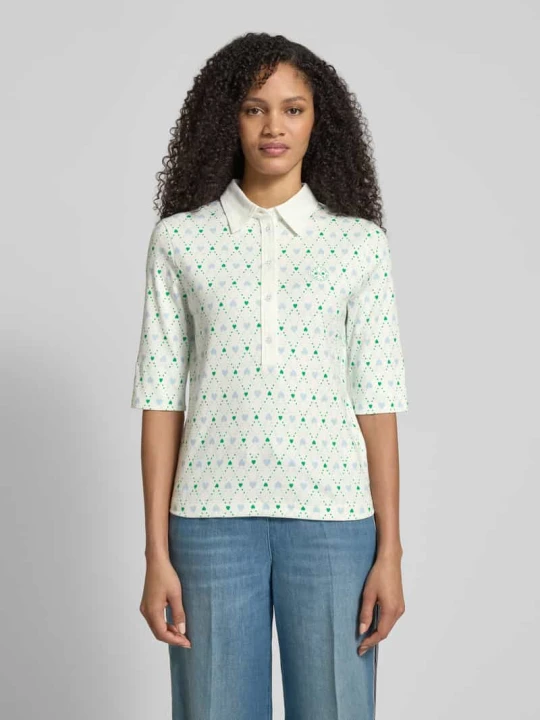 Zdjęcie produktu Koszulka polo krój slim fit z aplikacją z logo Marc Cain Złamany biały