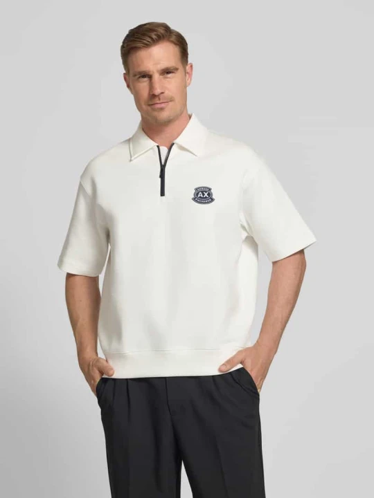 Zdjęcie produktu koszulka polo o kroju loose fit z wyhaftowanym logo Armani Exchange Złamany biały